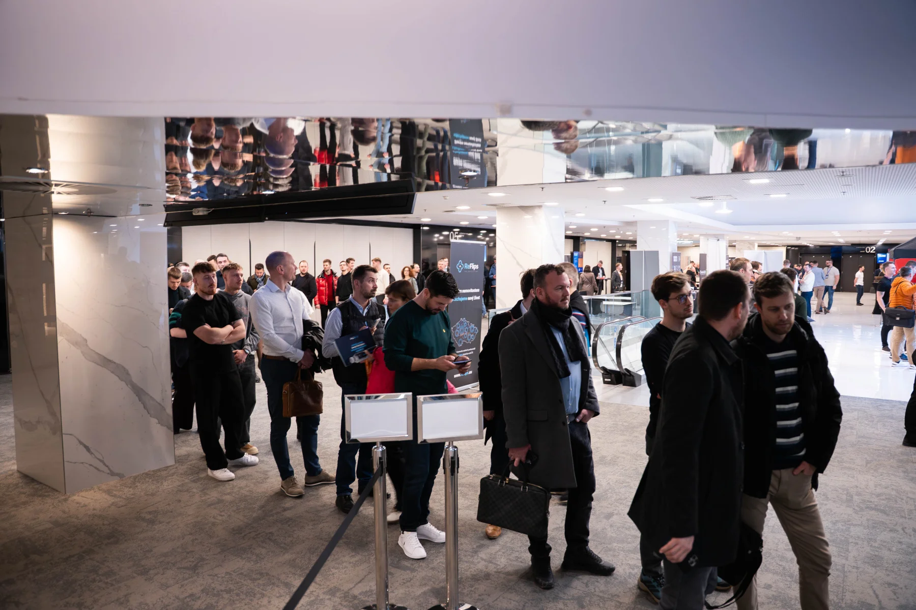 Fotografie z RE-FLIP konference 2026